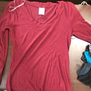 Red V-neck long sleeve shirt